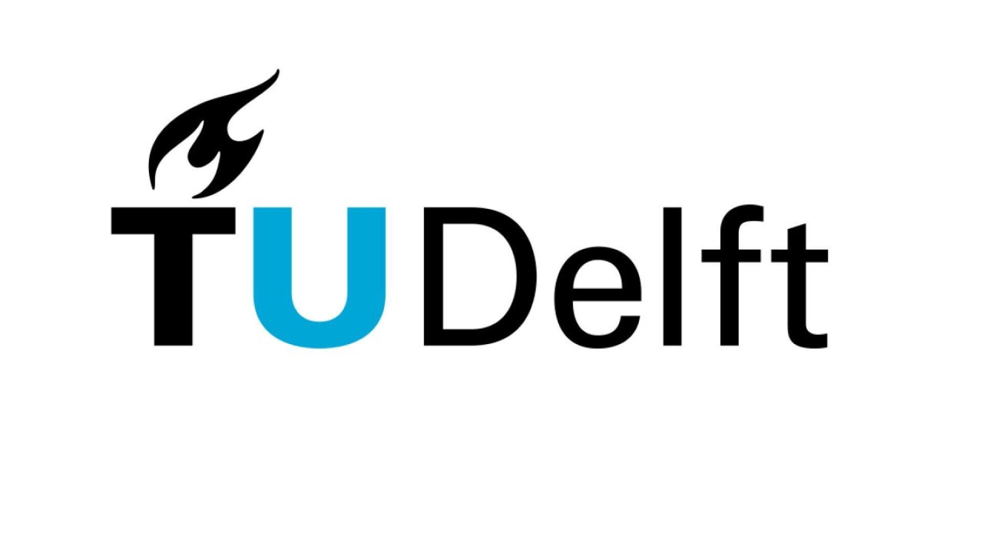 TU Delft logo with the letters TU Delft in black, except for the U which is blue. The T has a stylized black flame above its top left. The background is white.