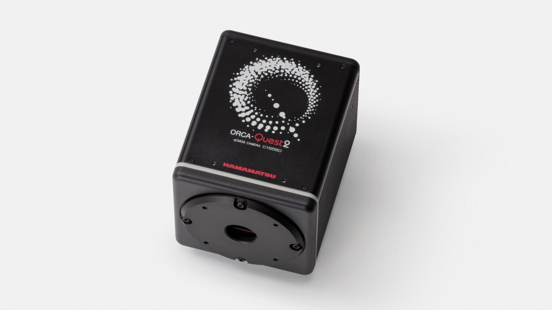 A black scientific camera labeled ORCA-Quest 2 by Hamamatsu, featuring a circular dot pattern on the top and a lens mount on the front, rests on a plain white background.